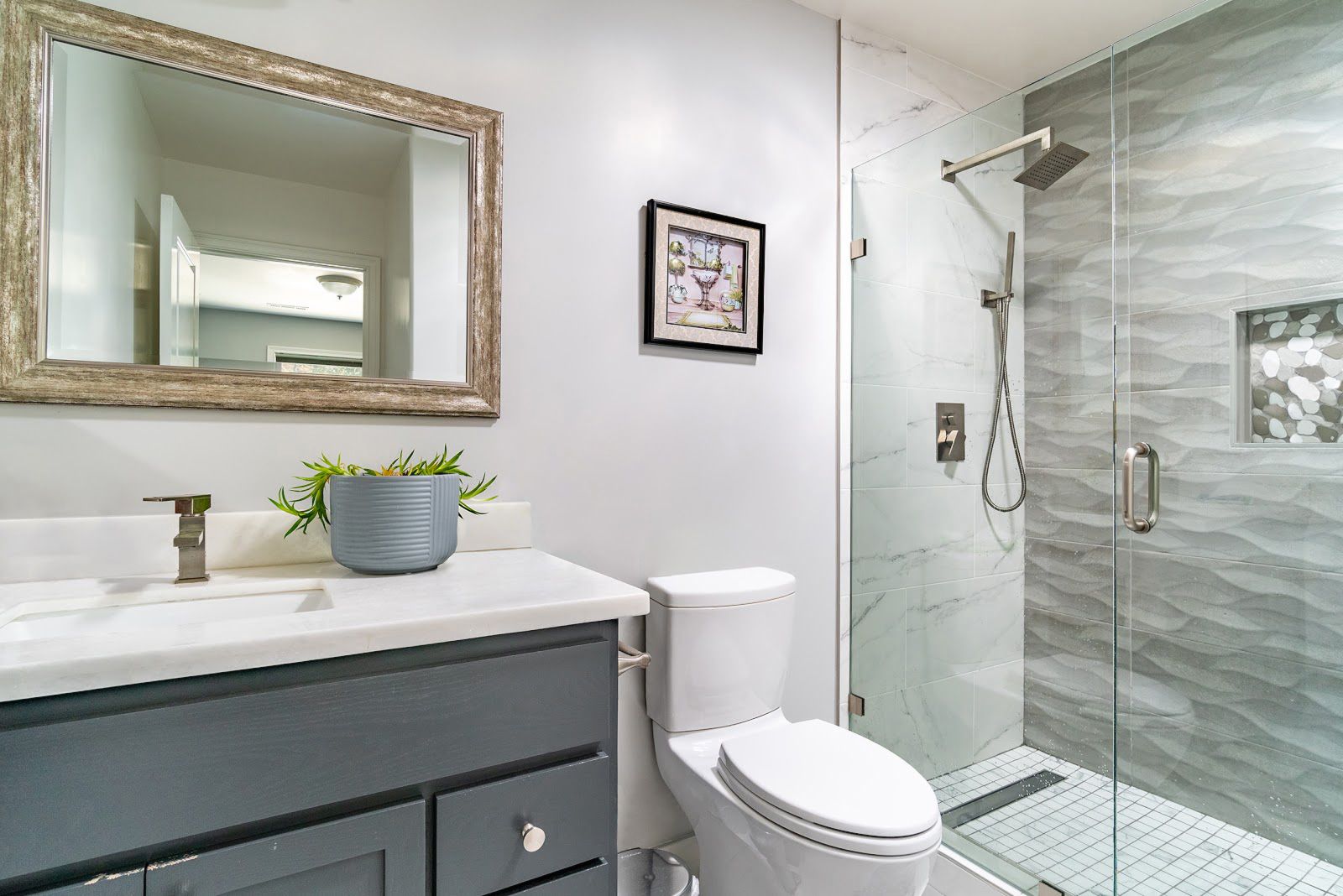 bathroom with walk in glass shower